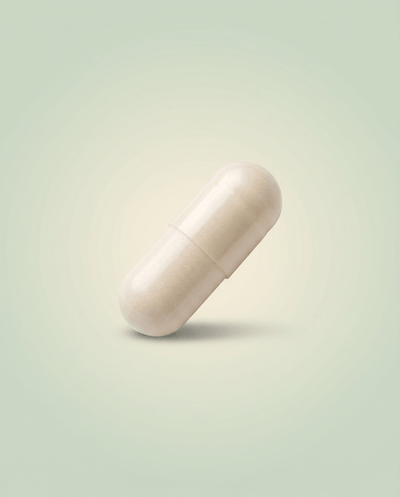 Кремава капсула Lactoflor ProBiotic на бледозелен фон